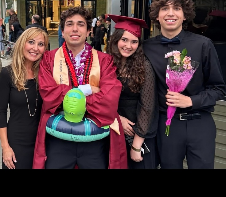 The Reyes-Dott family — founders of Global Coaching: Heal the Heart — together at a graduation celebration